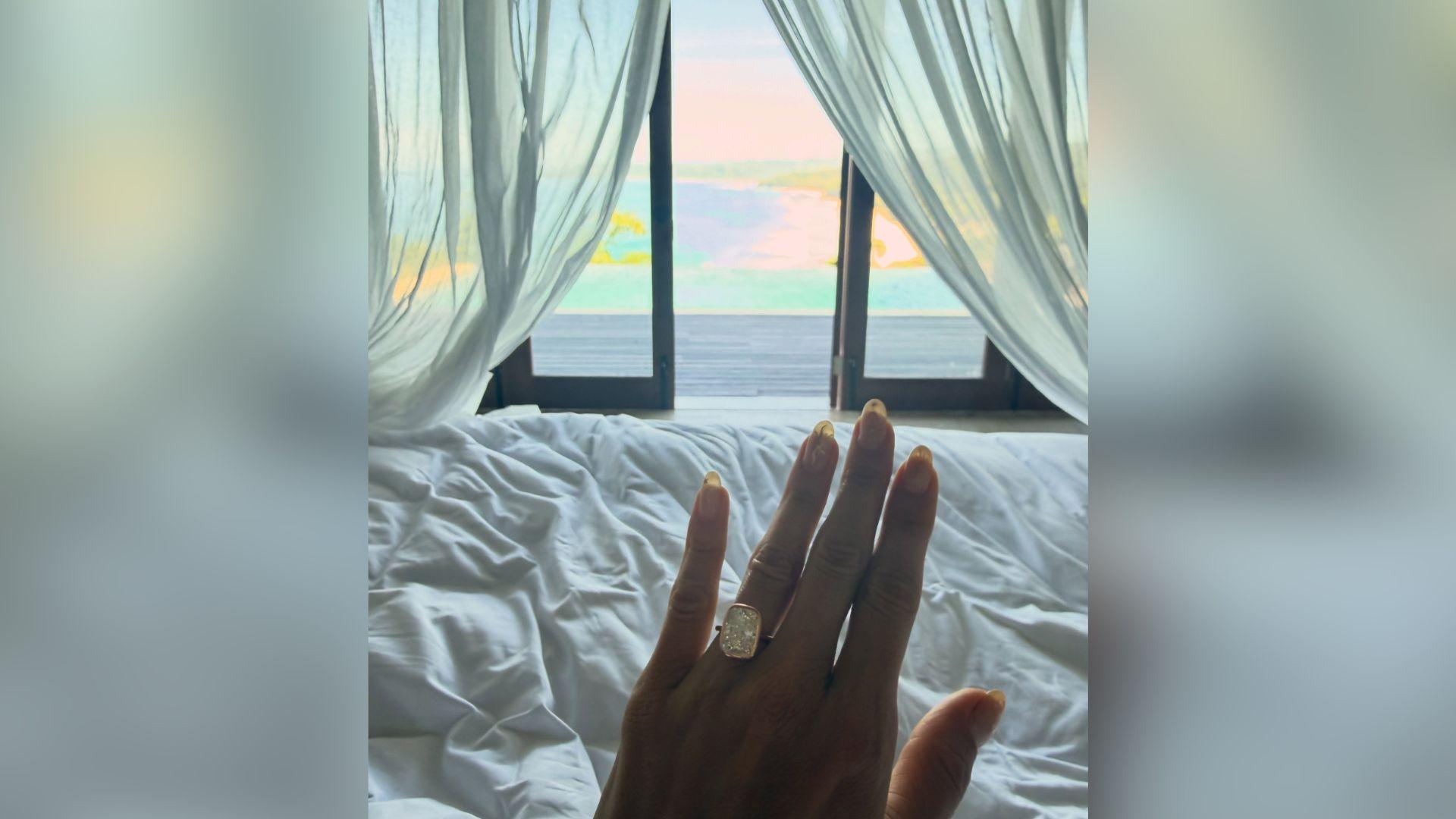 image of Alessandra Ambrosio announced her engagement to Australian jewelry designer Buck Palmer on Instagram.