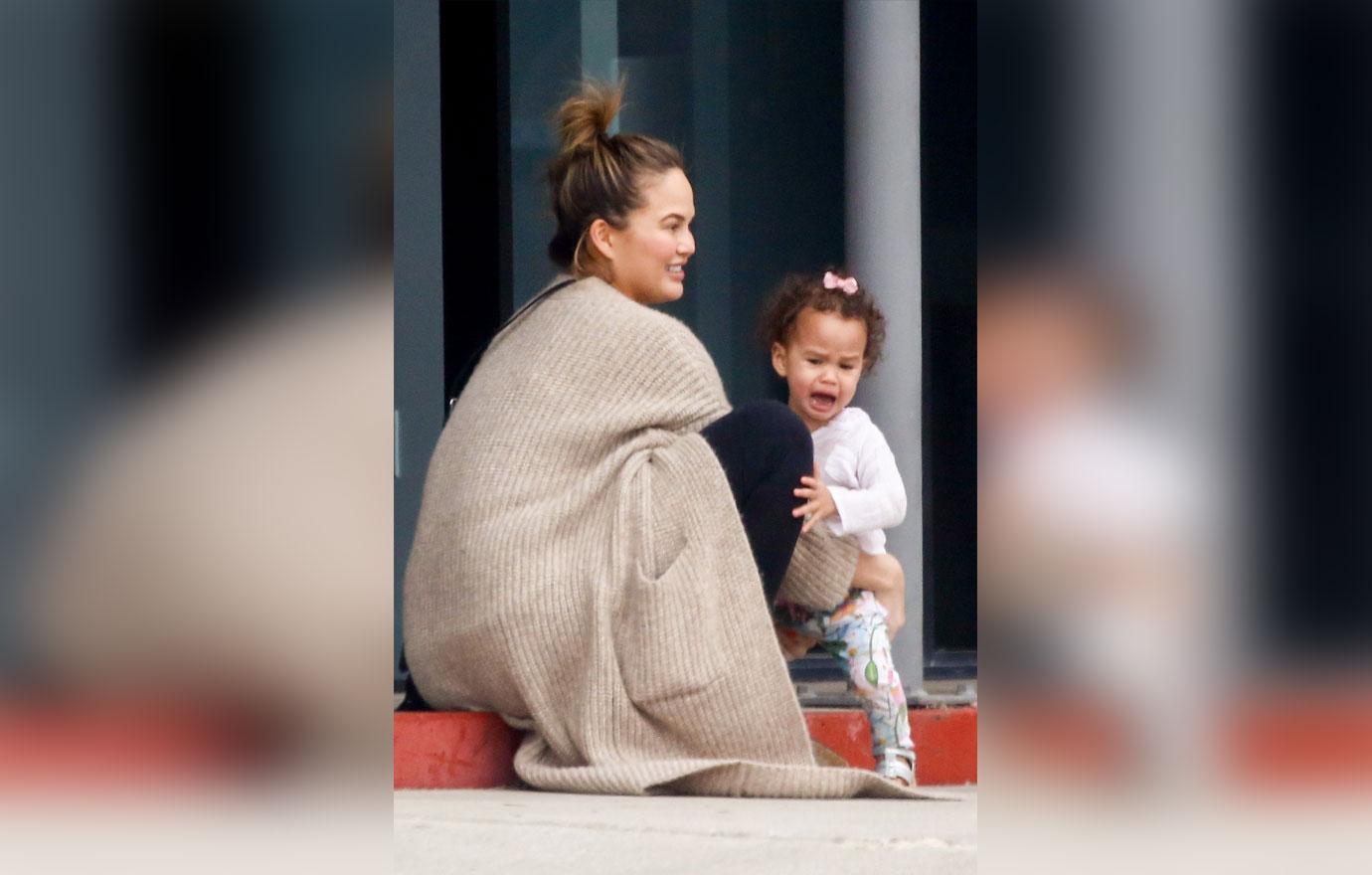 *EXCLUSIVE* Chrissy Teigen and John Legend shop at PC Greens with a cranky Luna