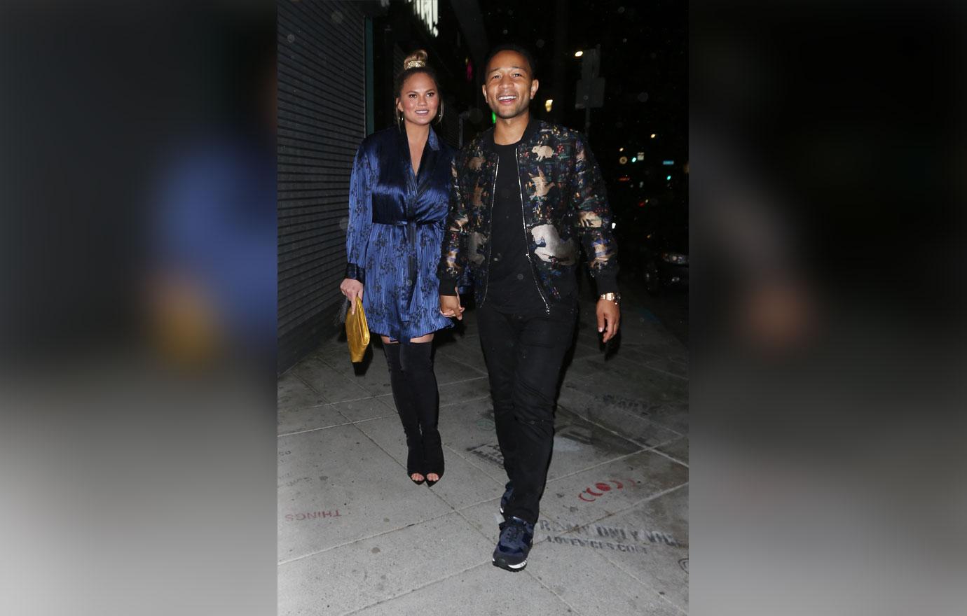 Chrissy Teigen and John Legend walk hand in hand as they exit Jon &amp; Vinny&#8217;s restaurant after dining with friends