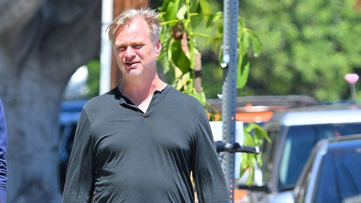 Image of Christopher Nolan revealed he discouraged actors from wearing Ugg boots between takes to help them stay immersed in the world of 'The Odyssey.'