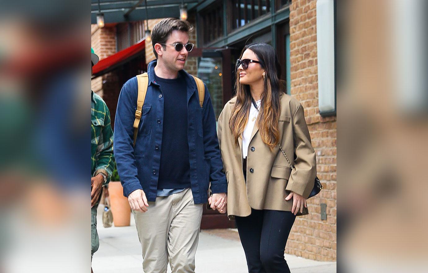 olivia munn and john mulaney seen holding hands as leaving their hotel in new york city