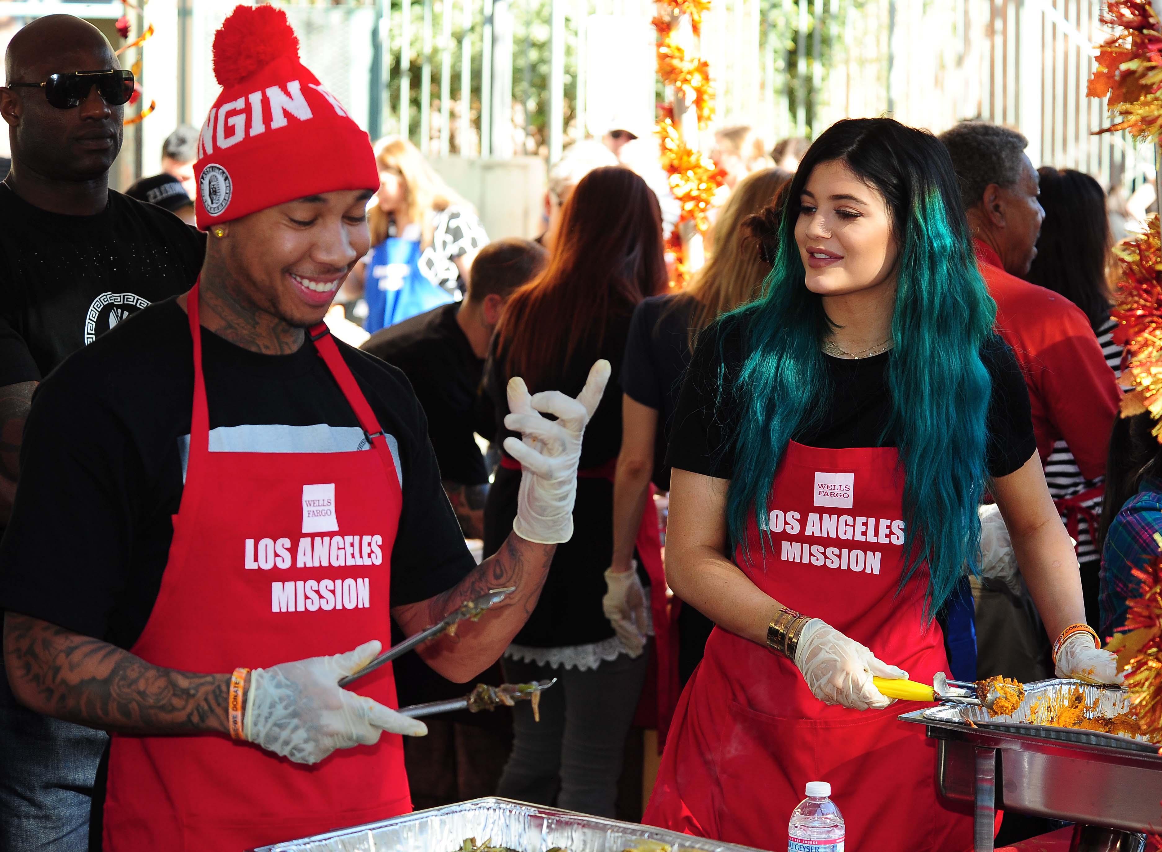 Kylie Jenner joins reported boyfriend, rapper Tyga, as they serve up Thanksgiving dinner to the homeless at the Los Angeles Mission in downtown Los Angeles, CA