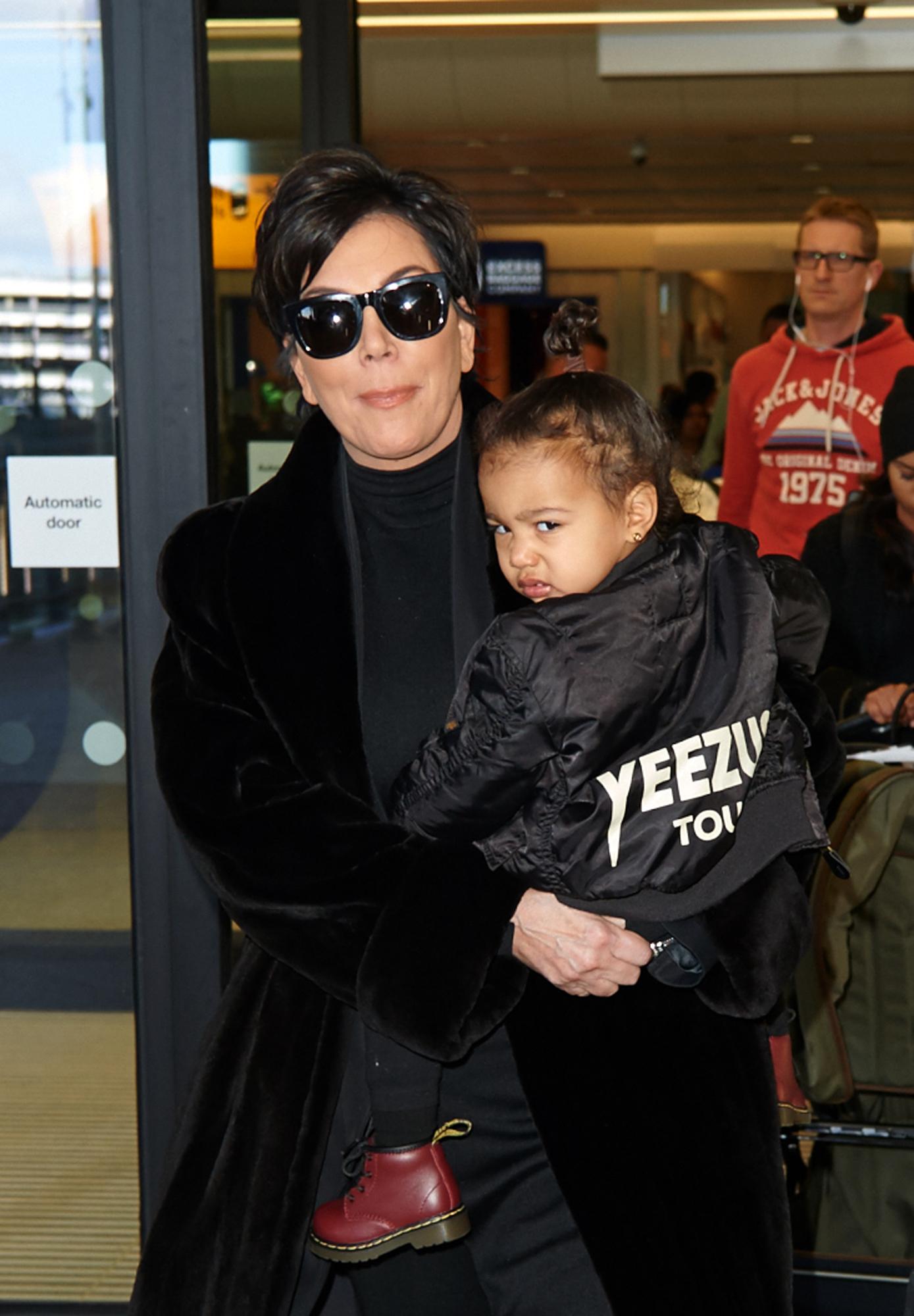 Kris Jenner and baby North West at Heathrow Airport