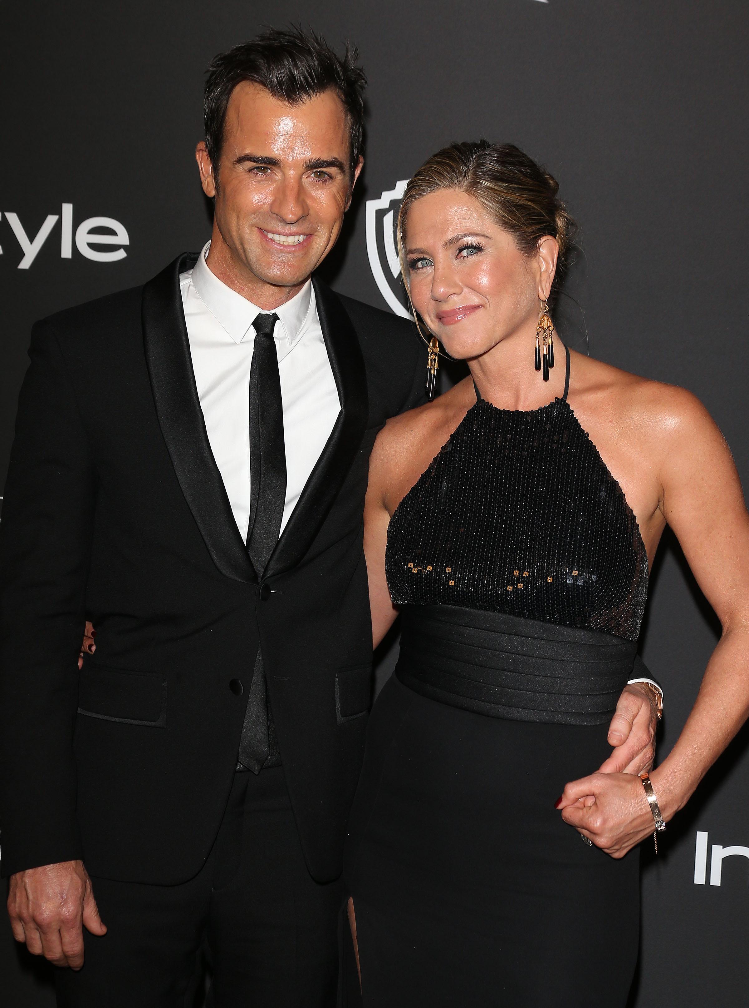 Jennifer Aniston and Justin Theroux arrive at the 16th Annual Warner Bros. and InStyle Post Golden Globe Party in Los Angeles