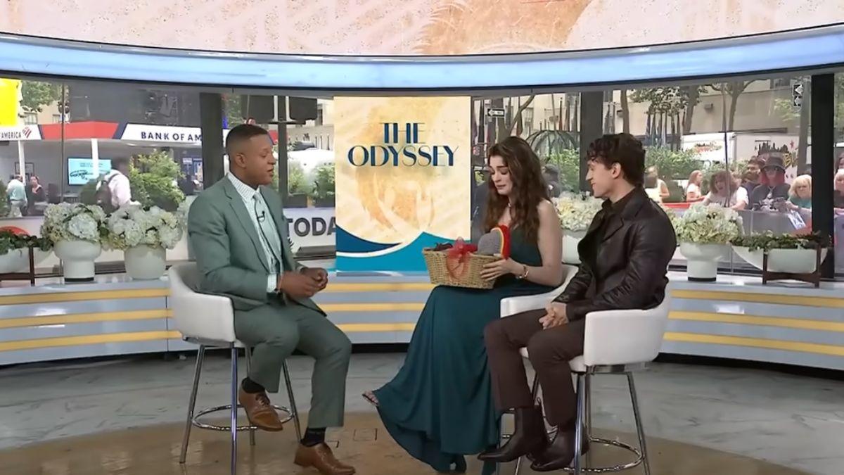Image of Anne Hathaway fought back tears after receiving a hand-knit baby gift inspired by 'The Odyssey.'