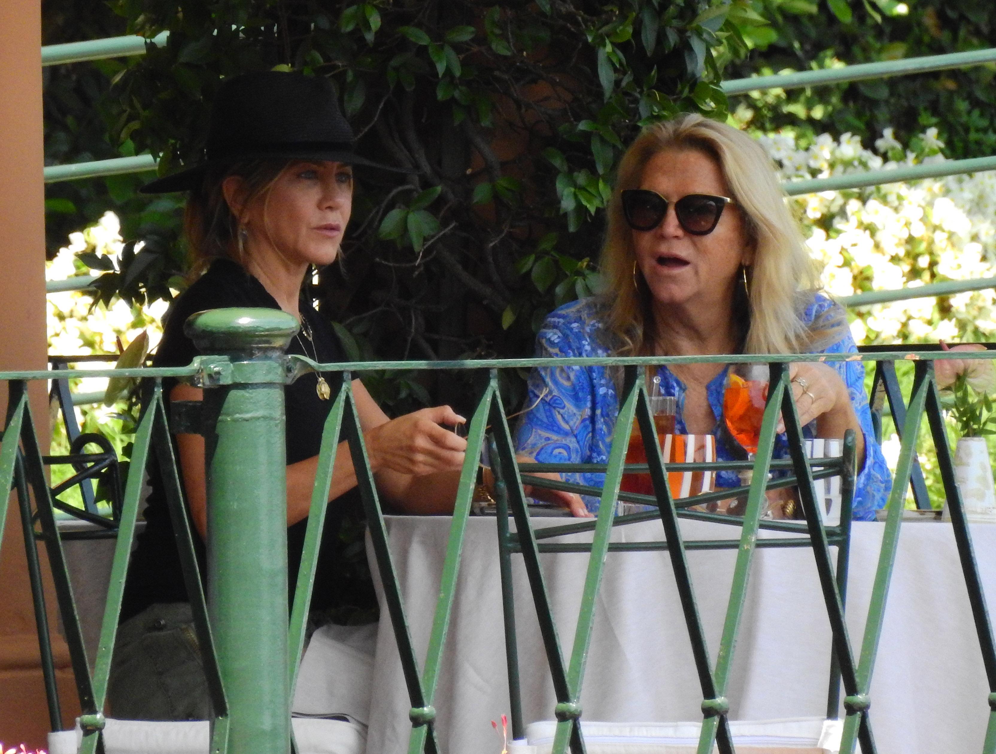 Jennifer Aniston having lunch with a friend in Portofino