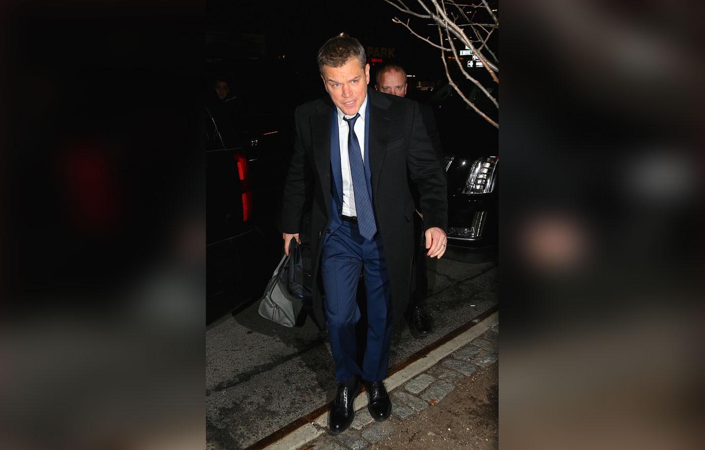 Matt damon carries wife purse