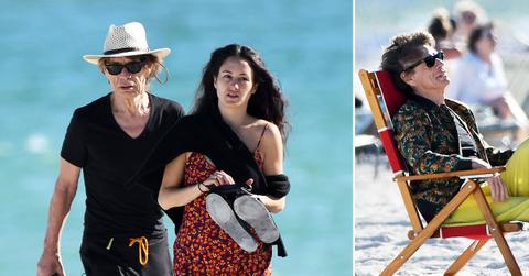 rolling stones mick jagger hits the beach decades younger girlfriend melanie hamrick