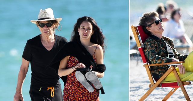 rolling stones mick jagger hits the beach decades younger girlfriend melanie hamrick