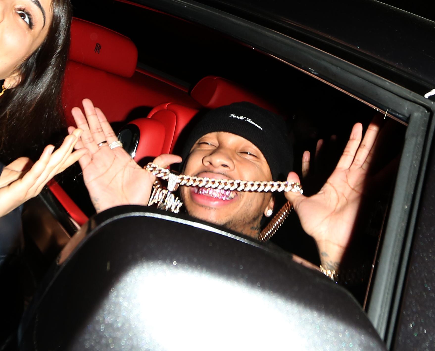 Tyga Shows Off His Diamond Mouth Piece As He And Kylie Jenner Leave Hyde Night Club in LA