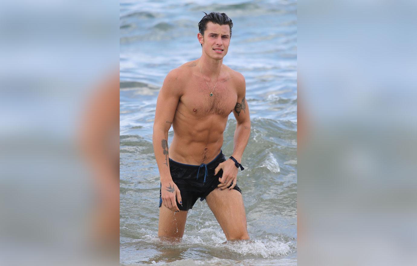 shawn mendes takes a dip in the ocean while in miami