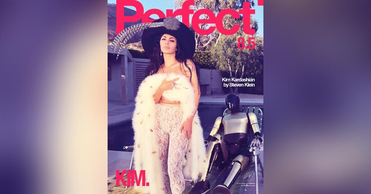 kim kardashian covers body oversized hat risque photoshoot