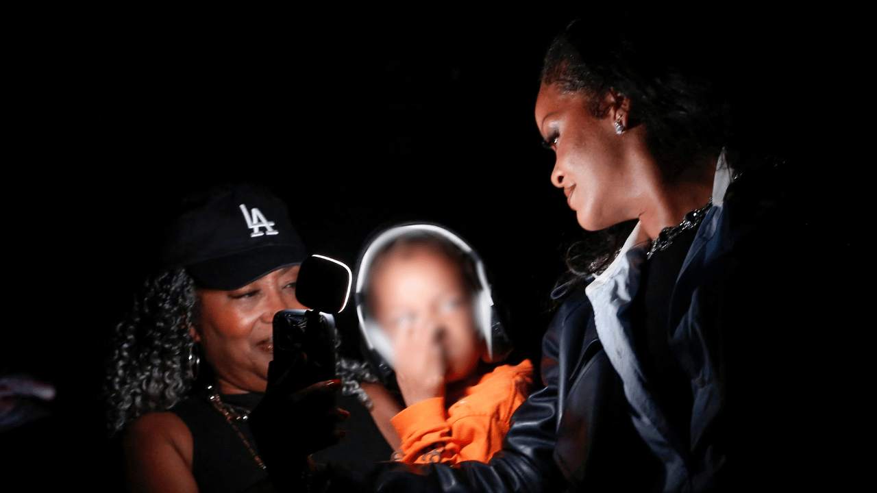Image of Rihanna stayed by her son's side as he experiences his dad's Paris concert.