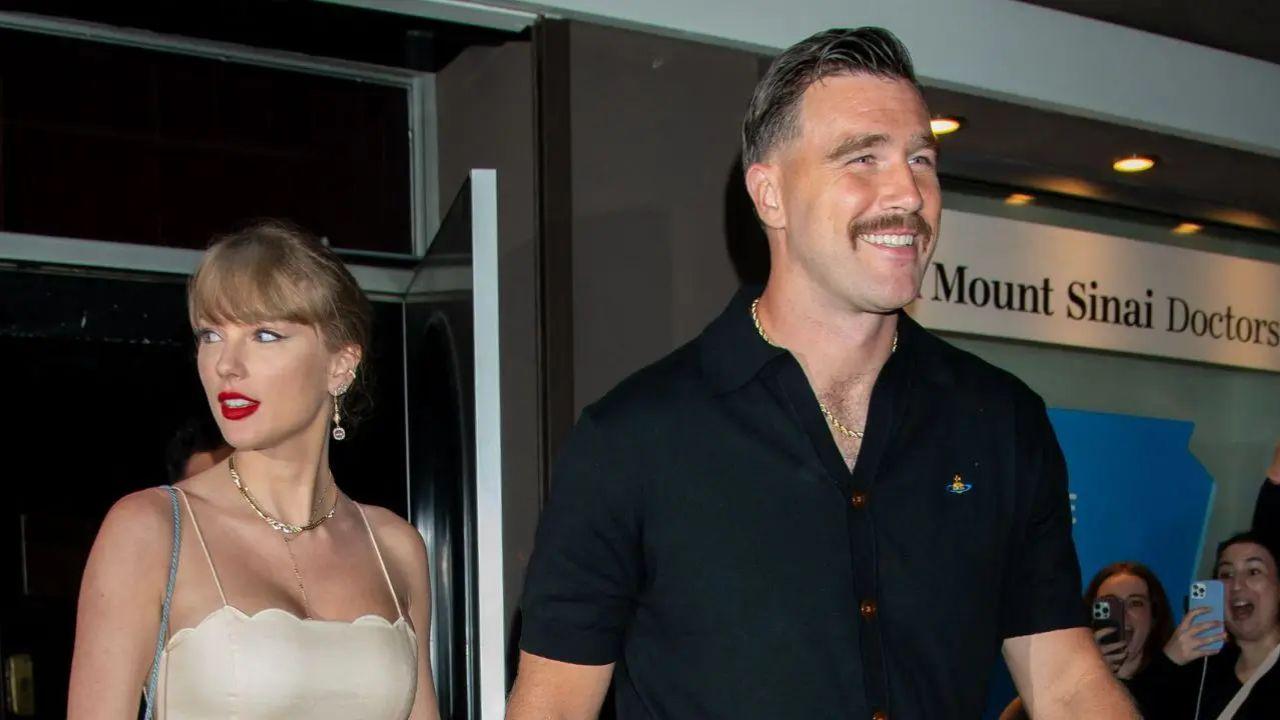 Image of Body language analyst Darren Stanton told 'Covers' that Travis Kelce looked 'hypervigilant' and 'protective' as he and Taylor Swift arrived at the Ambassadors Clubhouse in New York.