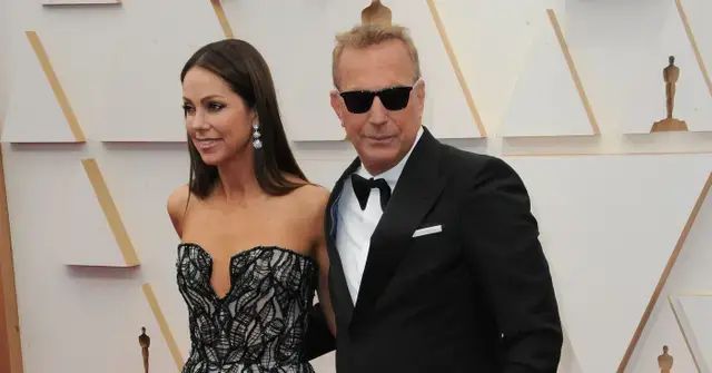 Photo of Kevin Costner and Christine Baumgartner.