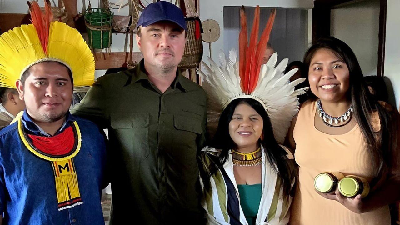 Image of DiCaprio with prominent Brazilian Indigenous leaders