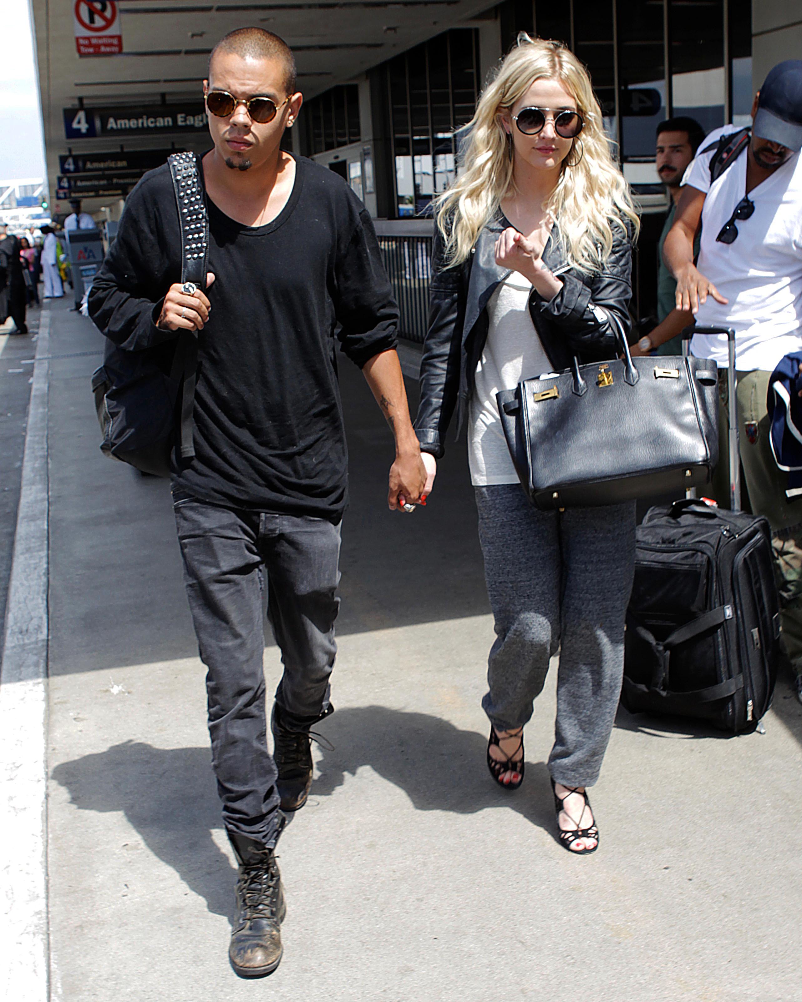 Ashlee Simpson and Evan Ross Land at LAX together