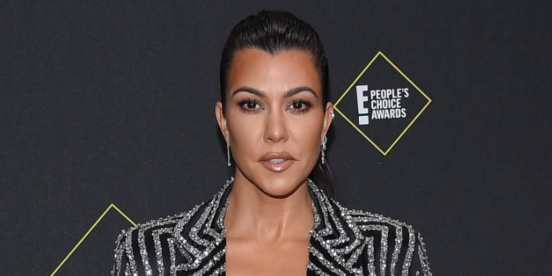 Kourtney Kardashian Wearing a Striped Suit on The Red Carpet