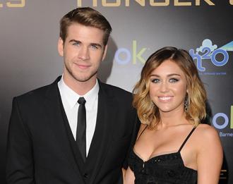 Liam hemsworth miley cyrus june6 engaged m.jpg