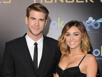 Liam hemsworth miley cyrus june6 engaged m.jpg