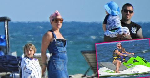 Pink family vacation beach jet skis