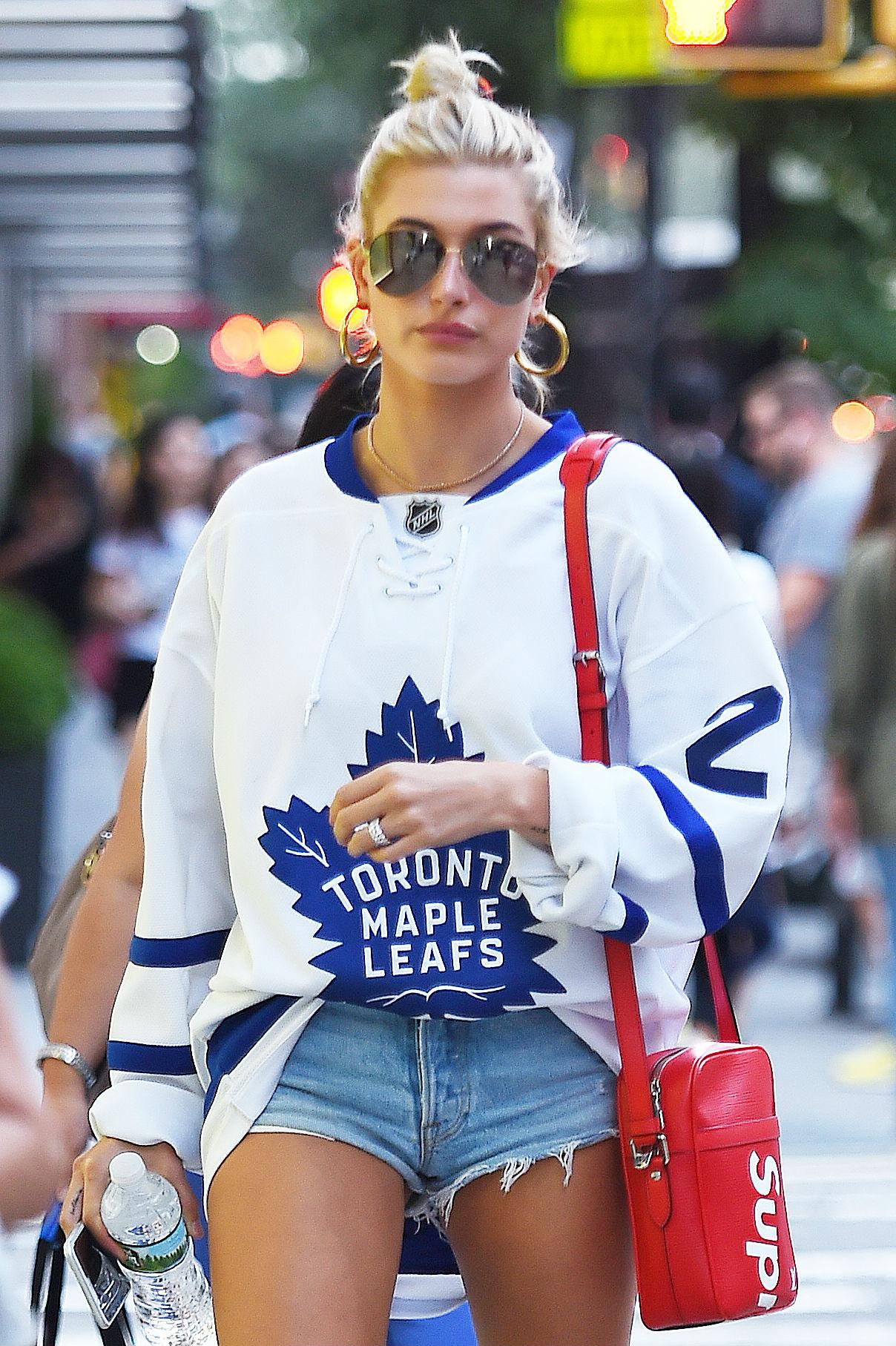 Hailey Baldwin Rocks Toronto Maple Leafs Jersey And Louis Vuitton X Supreme  Bag In NYC - VIBZN