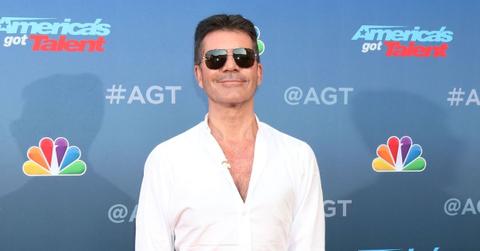 simon cowell breaks arm electric motorbike accident