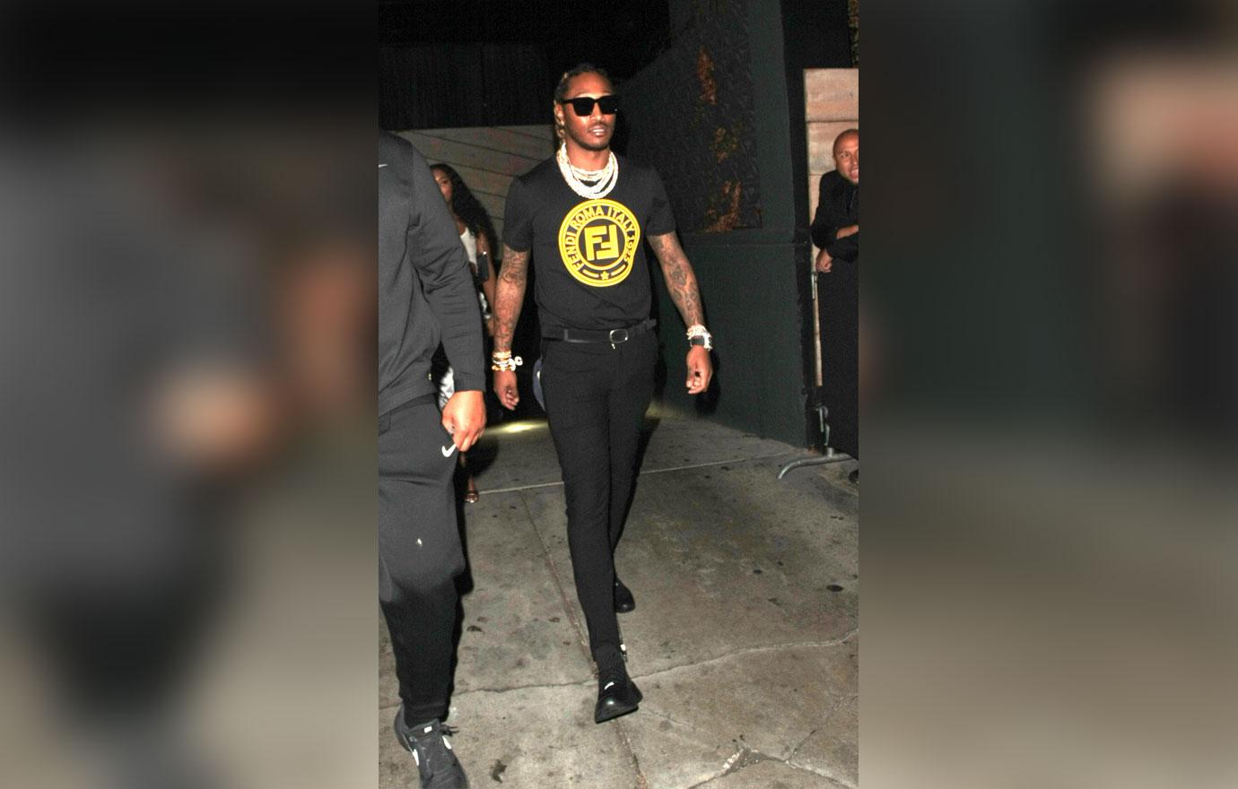 Future in yellow and black tee shirt