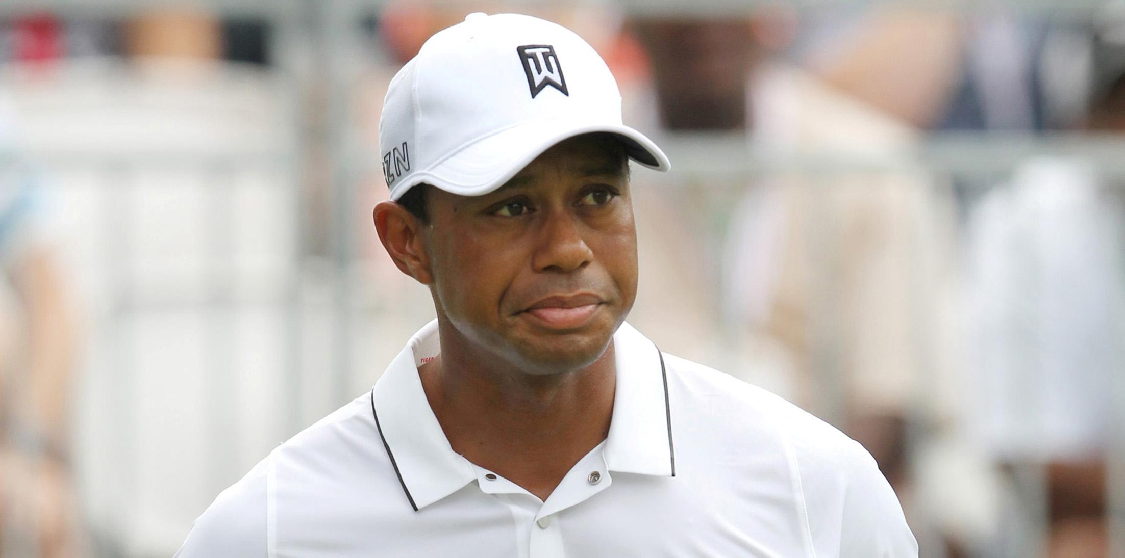 Tiger Woods putts around at the Quicken Loans National