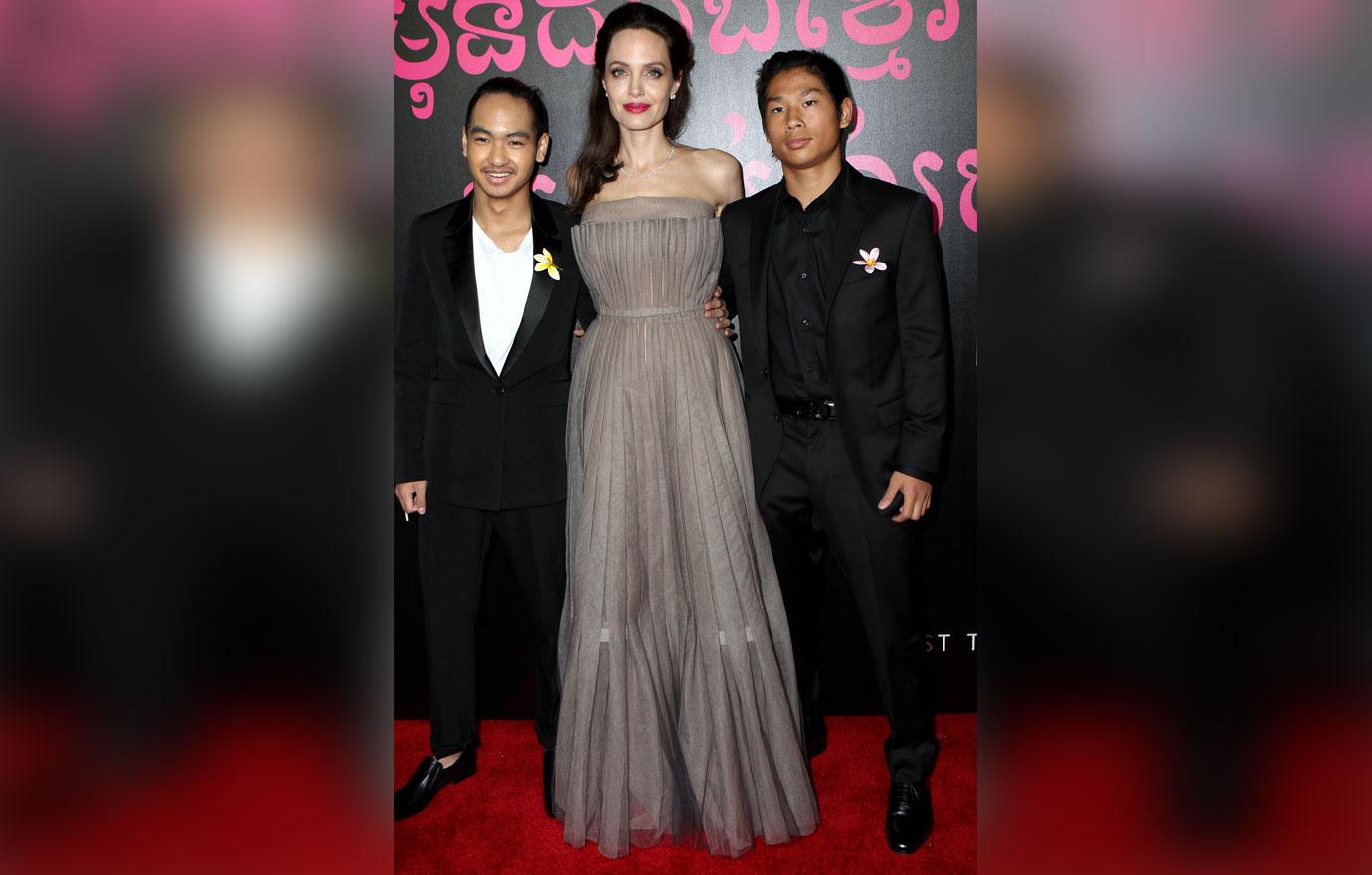 Angelina Jolie with Maddox and Pax