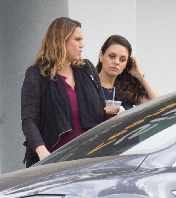 mila kunis pregnant baby bump tired