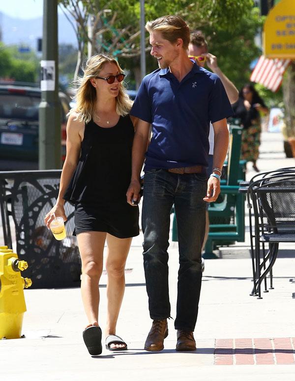 kaley cuoco karl cook date holding hands