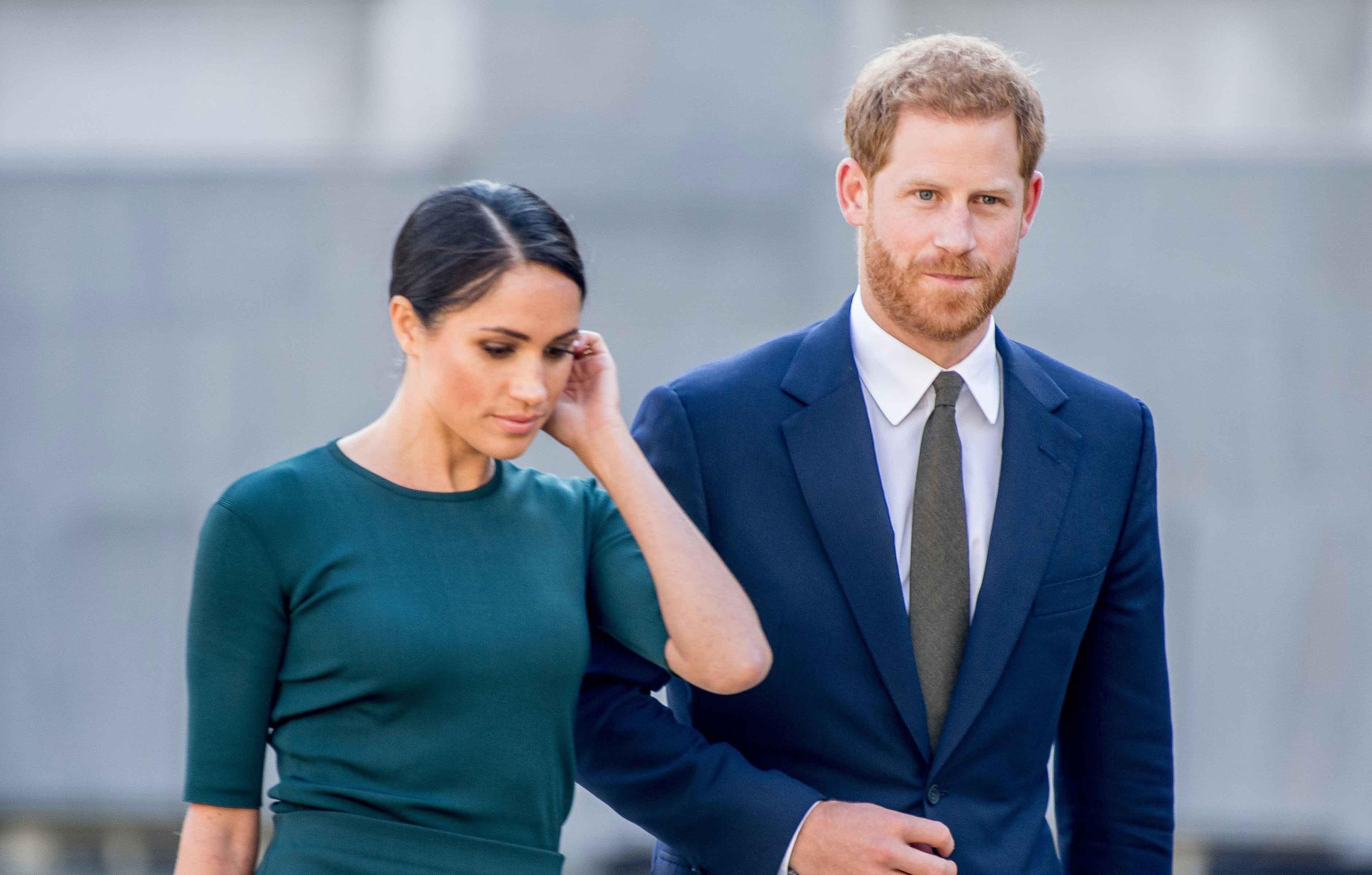 king charles wants to stay out of prince harry meghan markles drama