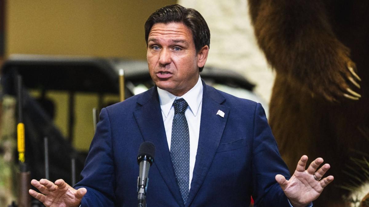 image of Ron DeSantis was reportedly 'begging' the president for a job. 