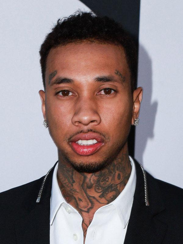 tyga tattoos on face