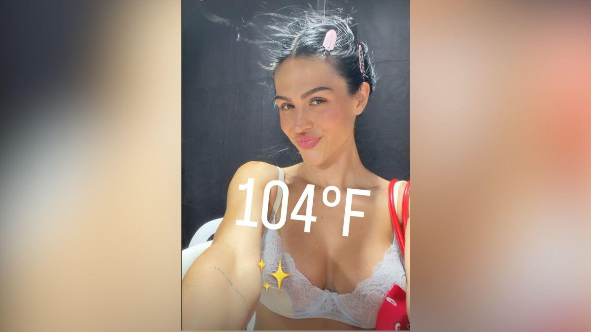 Imageof Amelia Gray Hamlin stunned in a white lace bra.