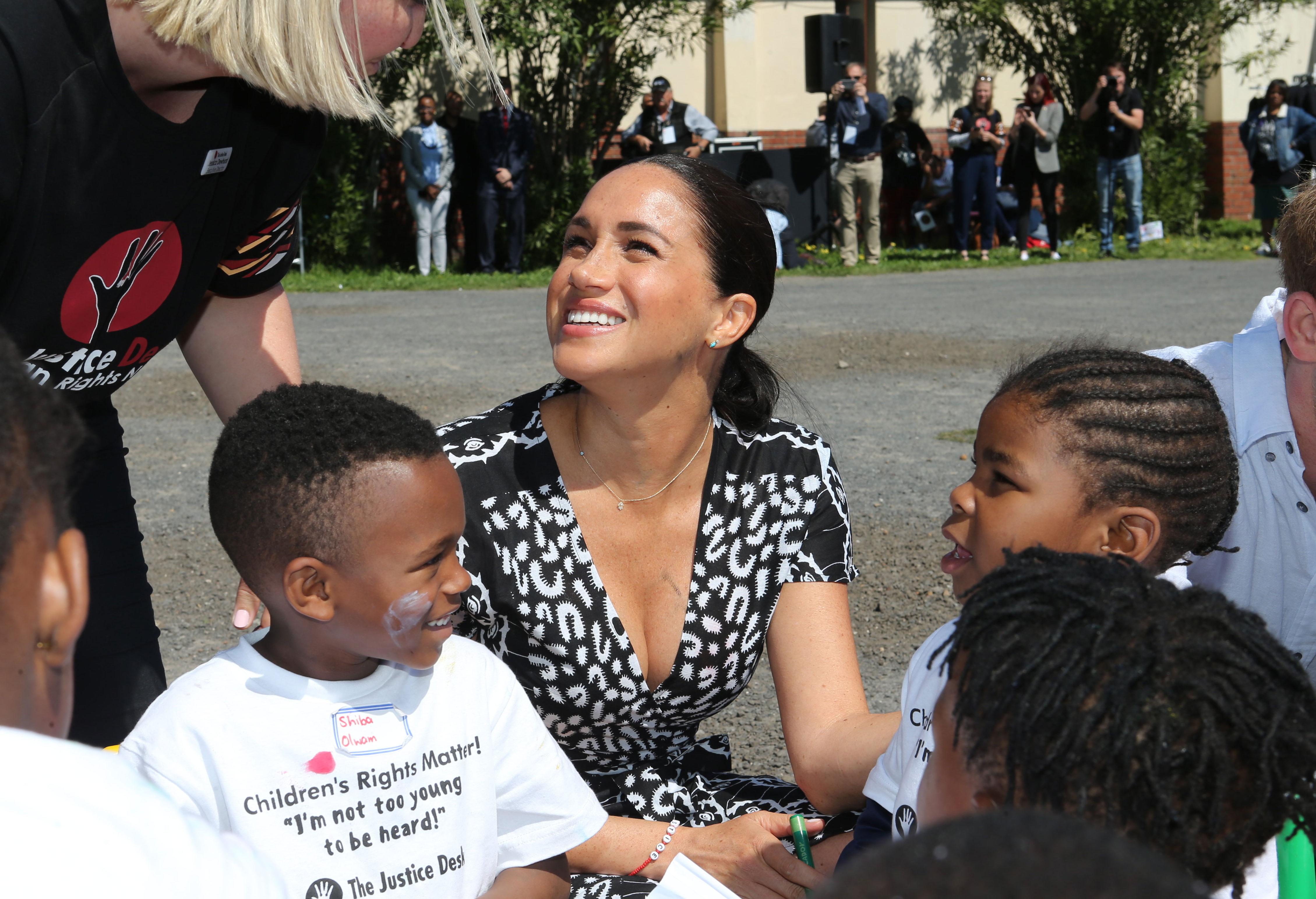 Meghan Markle Wearing $550 ‘Evil Eye’ Necklace On Royal Tour