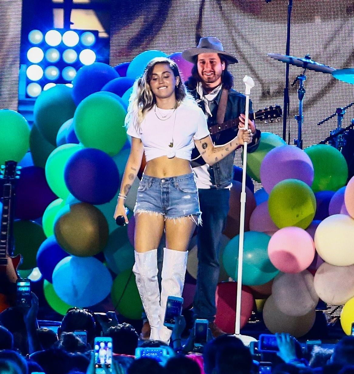 Miley Cyrus brings her colorful spirit to iHeartRadio