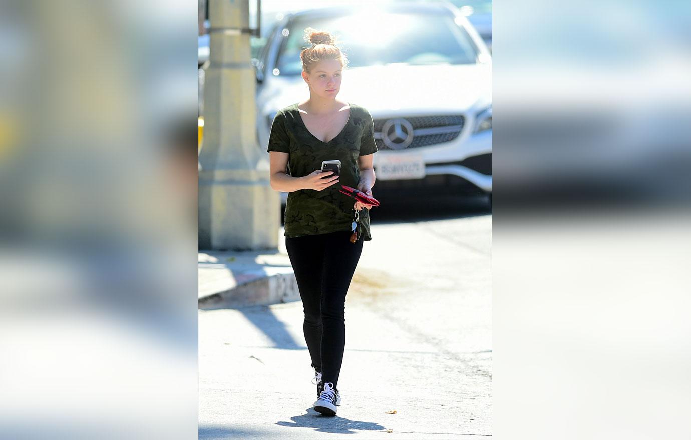 ariel winter walking with ponytail and leggings