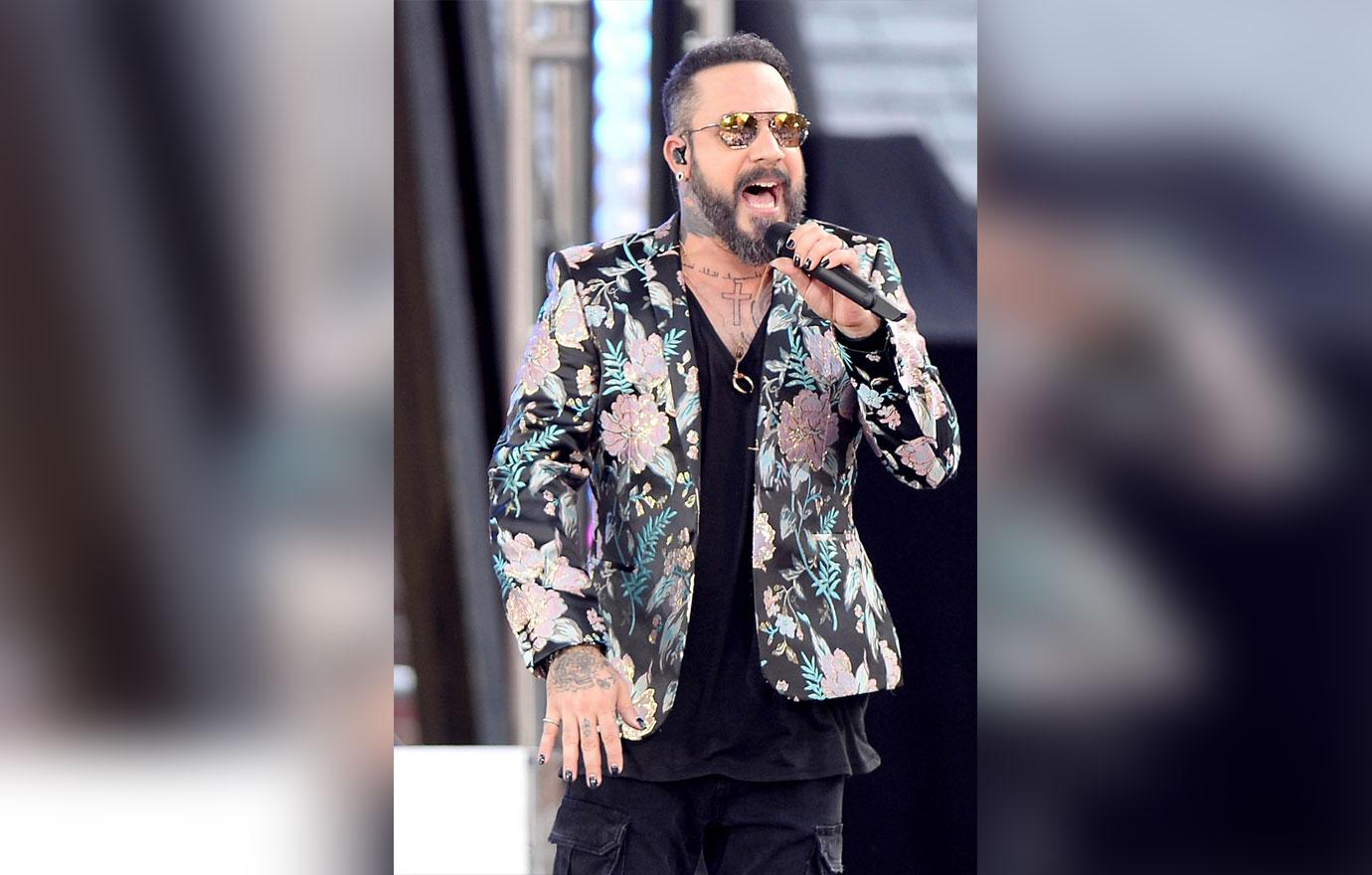 Aj mclean in floral blazer