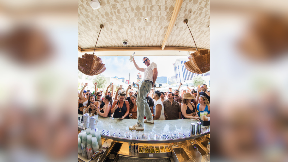 breaking bad reunion bryan cranston aaron paul get behind the bar and the dj booth for wild tequila bash in vegas