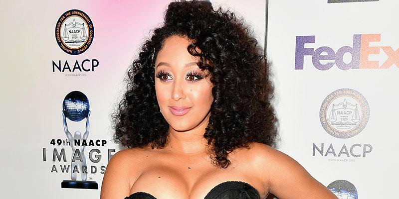 Tamera Mowry-Housley flaunts cleavage at NAACP dinner