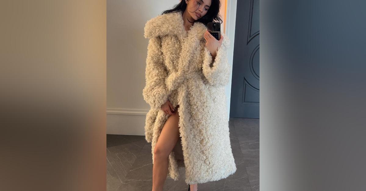 kylie jenner ditches pants shows legs coat khy clothing collection photos