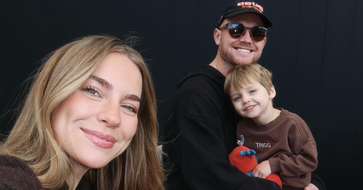 Photo of Emilie Kiser, her husband, Brady, and their late son, Trigg.