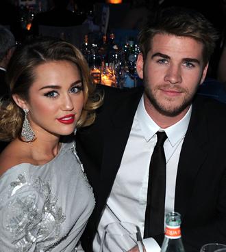 Miley cyrus liam hemsworth june12 rm.jpg