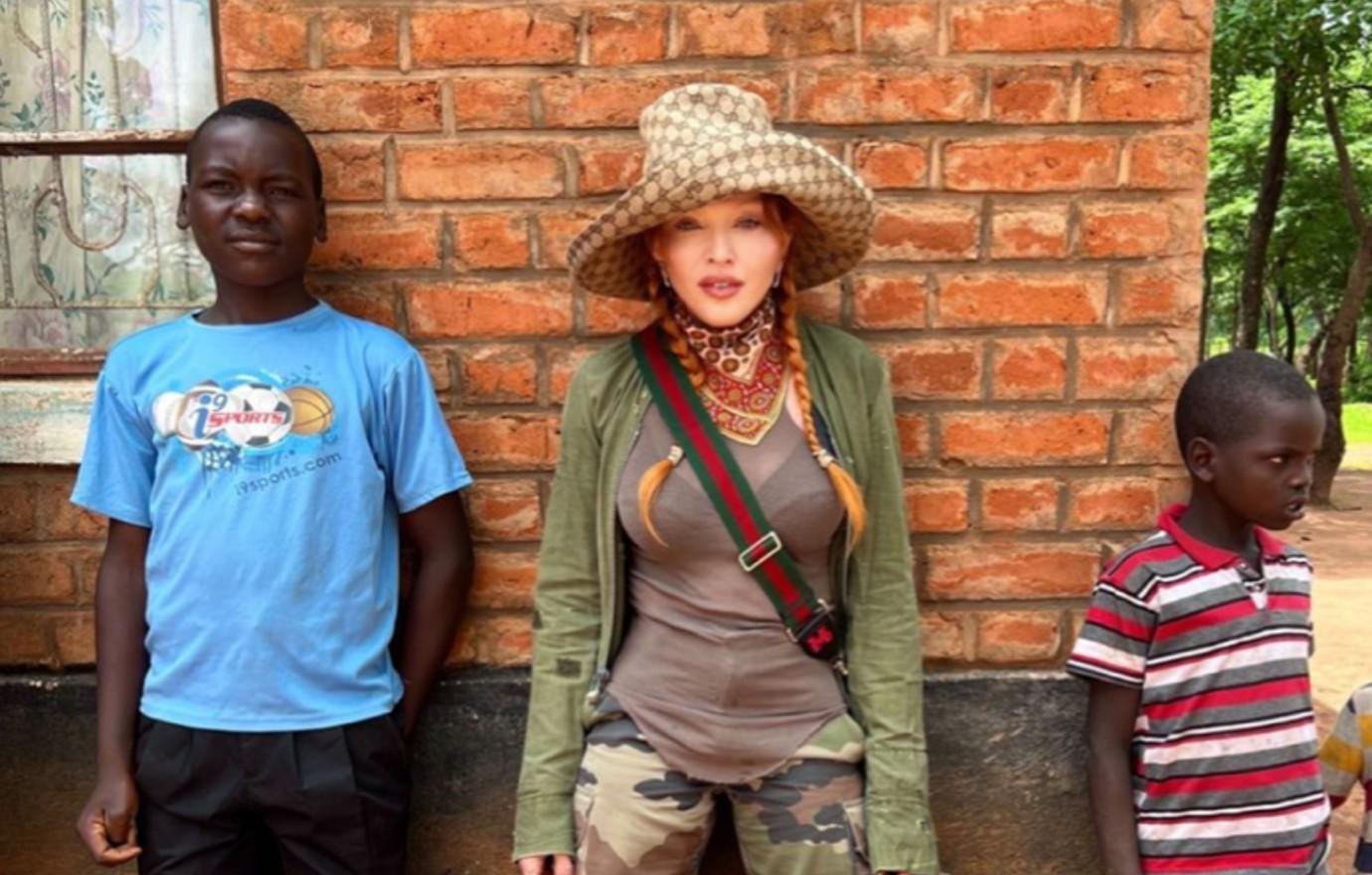 Madonna wears head-to-toe Gucci as she visits Malawi where four of