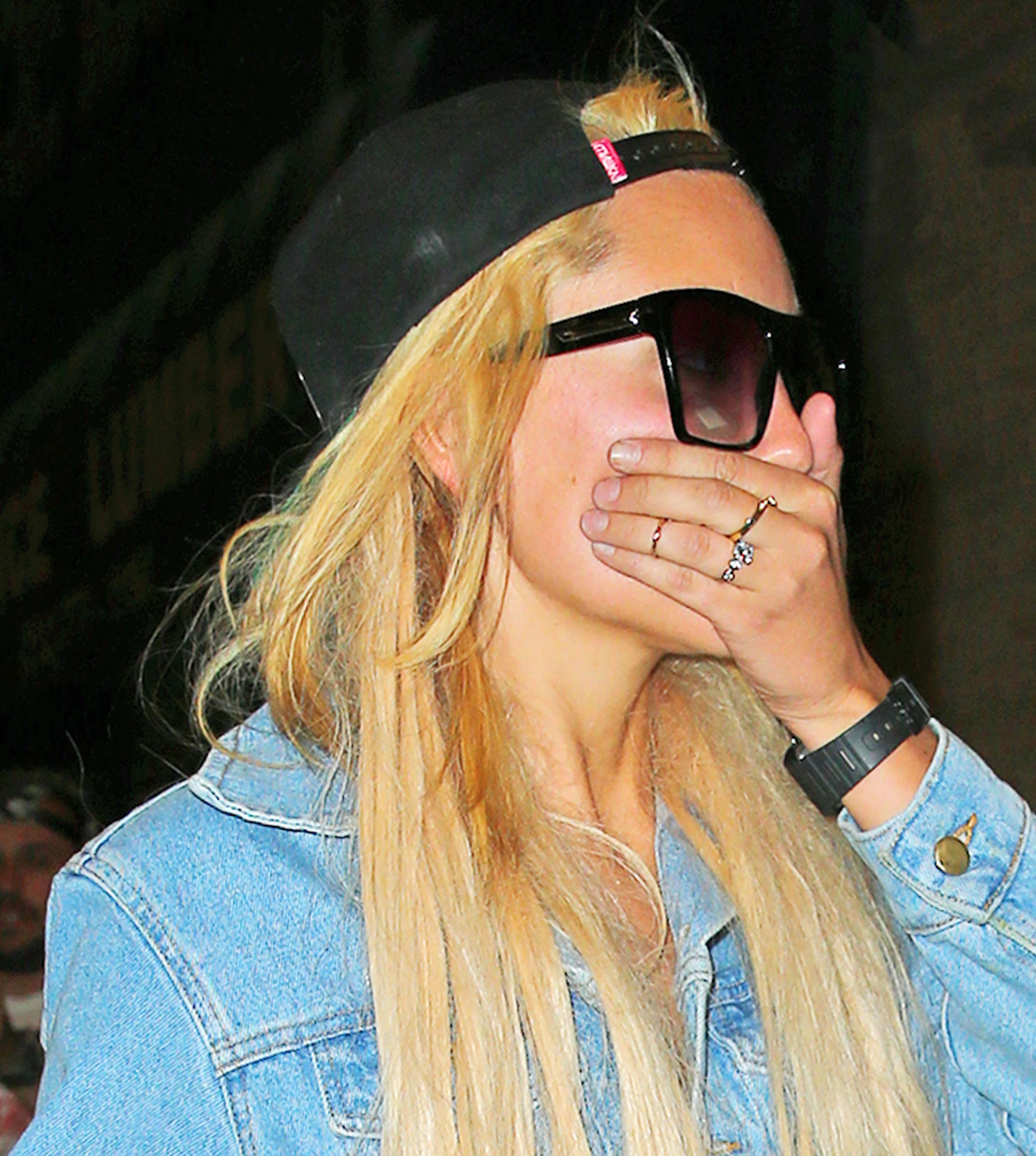 Amanda Bynes shows off her new engagement ring when she goes clubbing at Gilda Club in NYC