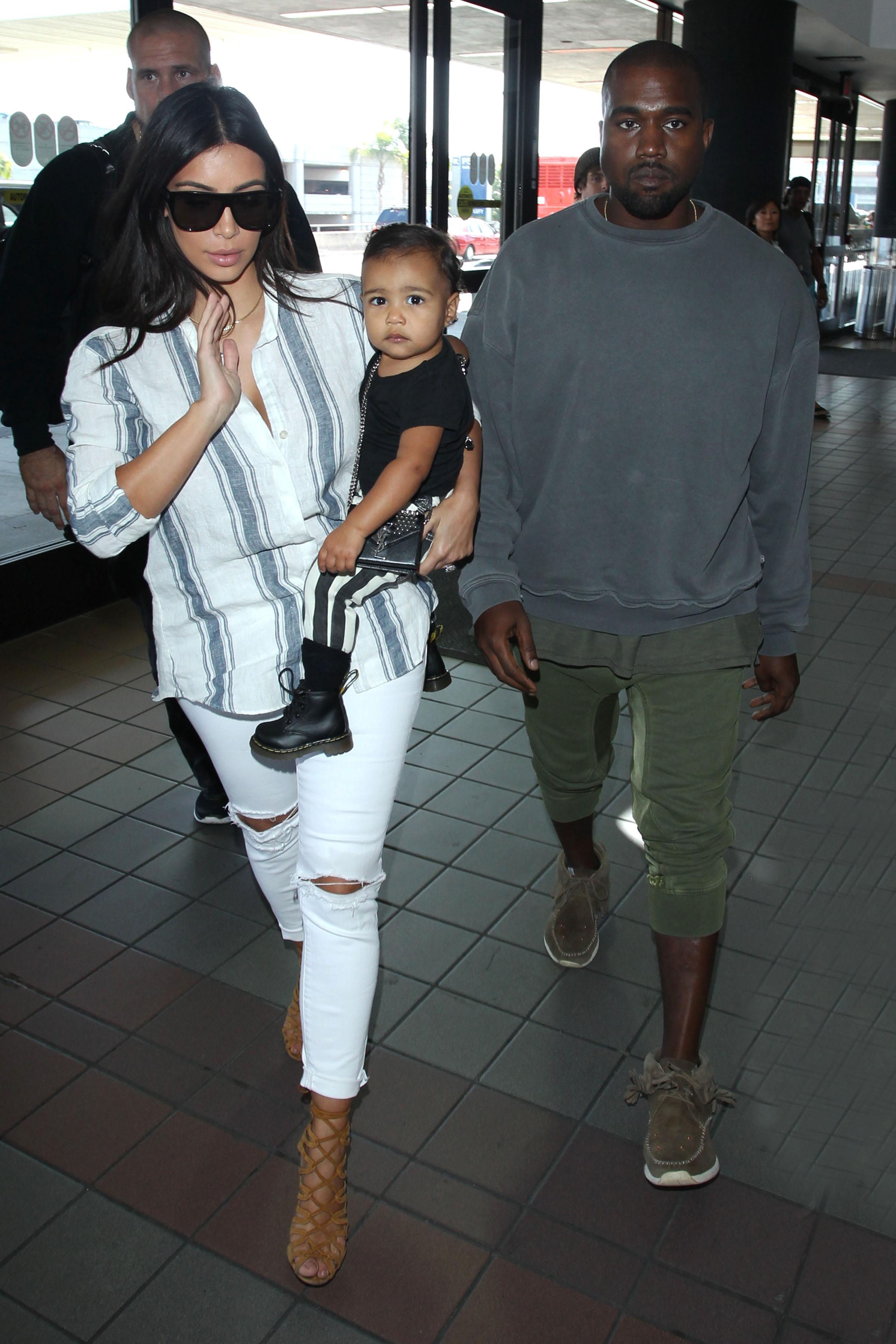 Kim Kardashian, Kanye West and baby North fly out of LAX