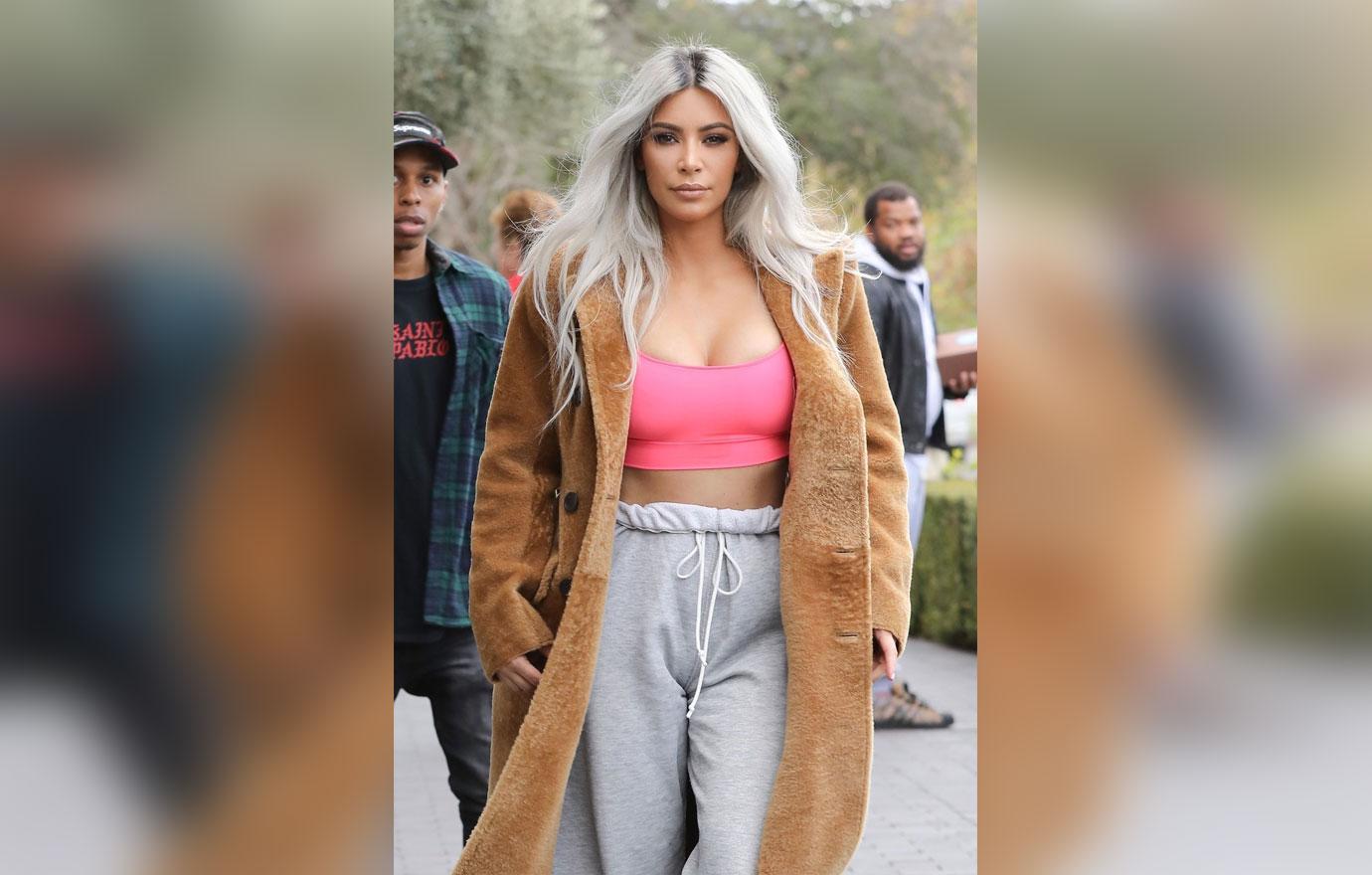 *EXCLUSIVE* Kim Kardashian stuffs herself into a pink tube top to grab some Valentine&#8217;s Day flowers