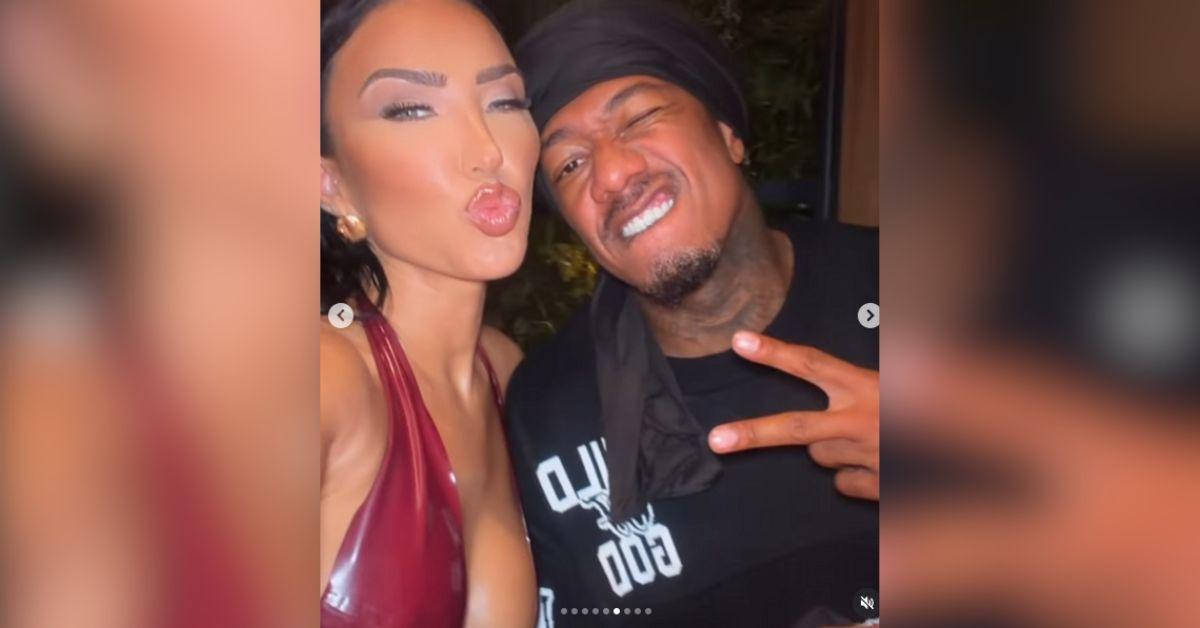 image of Photos showed Nick Cannon placing his arm around Bre Tiesi while she posed in a backless dress.